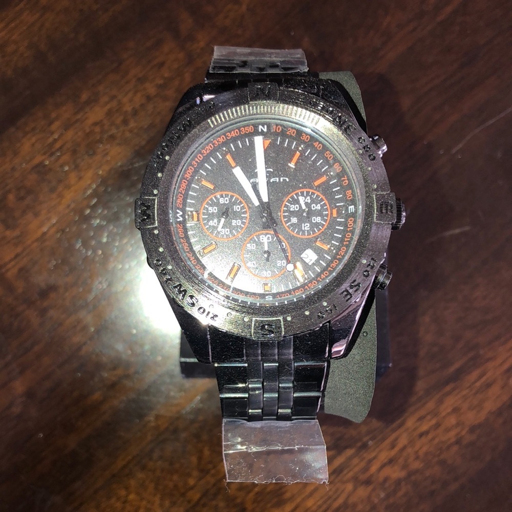 Men’s watch. Brand new, still has plastic on it.